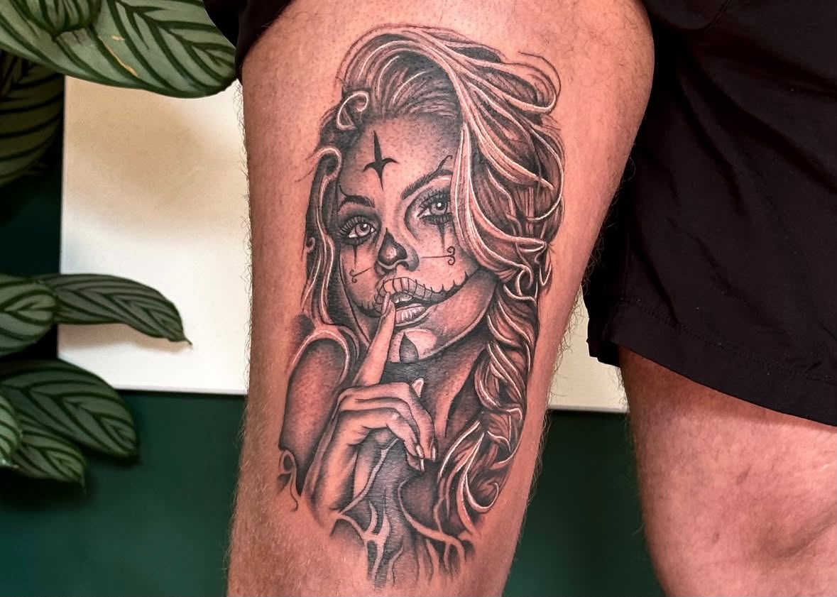 Day of the dead portrait tattoo on thigh