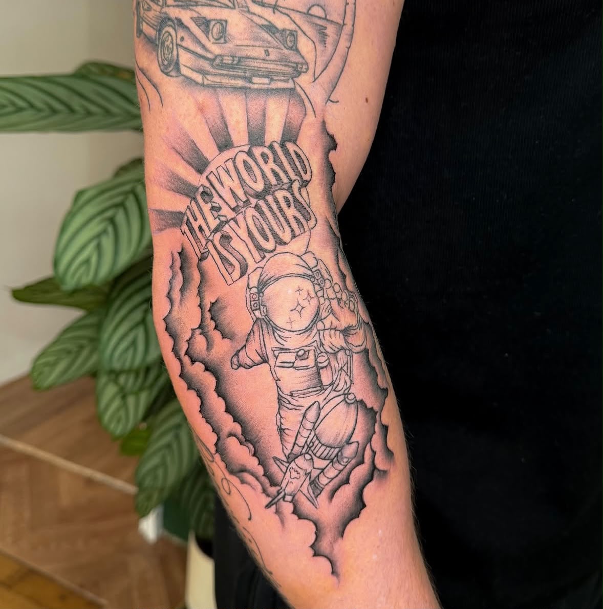 The world is yours astronaut sleeve tattoo